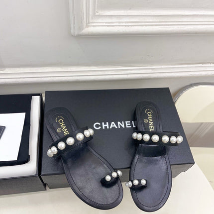 CHANEL 26S THONG SANDALS IN BLACK LAMBSKIN WITH PEARL EMBELLISHMENTS