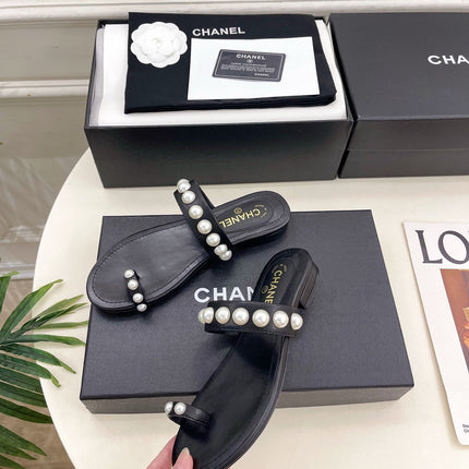 CHANEL 26S THONG SANDALS IN BLACK LAMBSKIN WITH PEARL EMBELLISHMENTS