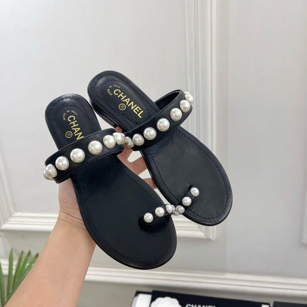 CHANEL 26S THONG SANDALS IN BLACK LAMBSKIN WITH PEARL EMBELLISHMENTS