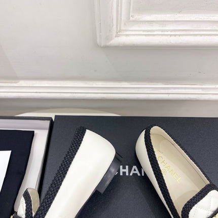CHANEL 26S LOAFER MULES IN WHITE LAMBSKIN AND BLACK FABRIC