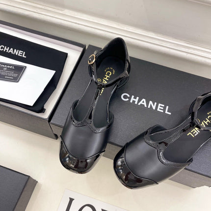 CHANEL 26S T STRAP MARY JANES IN BLACK PATENT AND LAMBSKIN