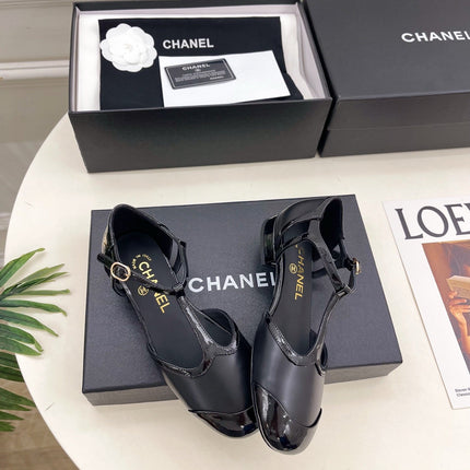 CHANEL 26S T STRAP MARY JANES IN BLACK PATENT AND LAMBSKIN