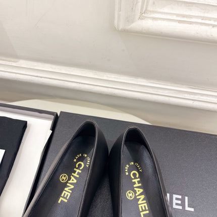 CHANEL 26S BALLET FLATS IN BLACK LAMBSKIN WITH FLOWER EMBELLISHMENT