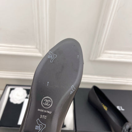 CHANEL 26S BALLET FLATS IN BLACK LAMBSKIN WITH FLOWER EMBELLISHMENT