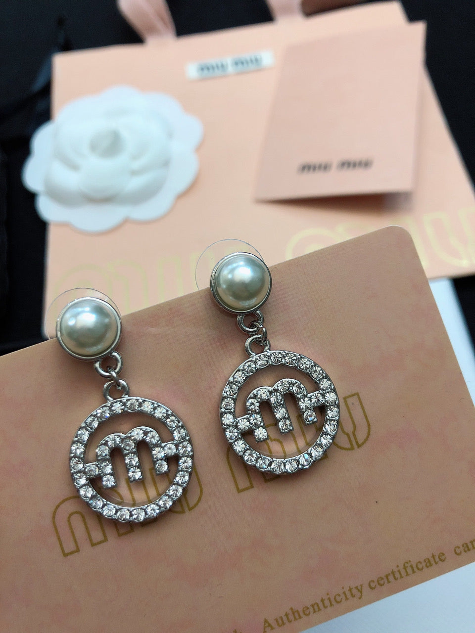 MIUMIU 26S PEARL DROP CRYSTAL LOGO CIRCLE EARRINGS IN SILVER TONE METAL 615772