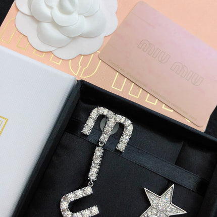 MIUMIU 26S CRYSTAL LOGO DROP EARRING AND STAR STUD EARRING SET IN SILVER TONE METAL 630843