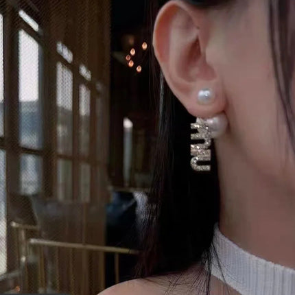 MIUMIU 26S CRYSTAL LOGO PEARL DROP EARRINGS IN SILVER TONE METAL 620414