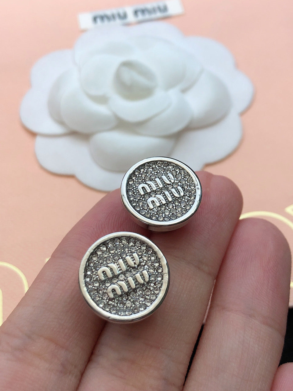 MIUMIU 26S CRYSTAL MIU LOGO ROUND STUD EARRINGS IN SILVER TONE METAL 630845