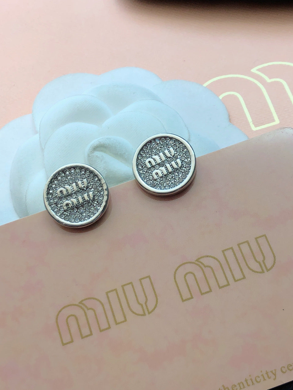 MIUMIU 26S CRYSTAL MIU LOGO ROUND STUD EARRINGS IN SILVER TONE METAL 630845