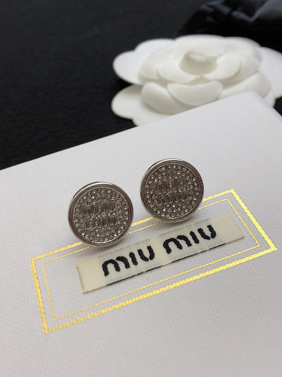 MIUMIU 26S CRYSTAL MIU LOGO ROUND STUD EARRINGS IN SILVER TONE METAL 630845