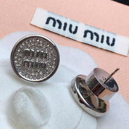 MIUMIU 26S CRYSTAL MIU LOGO ROUND STUD EARRINGS IN SILVER TONE METAL 630845