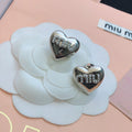 MIUMIU 26S HEART LOGO STUD EARRINGS WITH PEARL DETAILS IN SILVER TONE METAL 630844