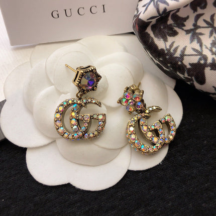 GUCCI 26S DOUBLE G LOGO MULTICOLOR CRYSTAL DROP STATEMENT EARRINGS IN AGED GOLD TONE METAL 629027