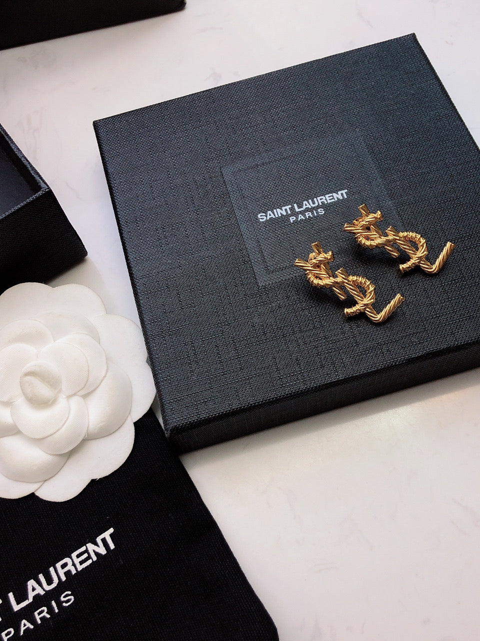 YSL 26S TWISTED ROPE LOGO STUD EARRINGS IN GOLD TONE METAL 629135