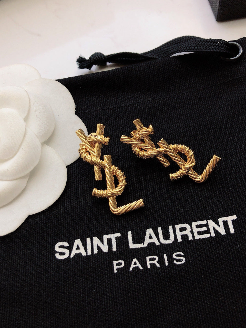 YSL 26S TWISTED ROPE LOGO STUD EARRINGS IN GOLD TONE METAL 629135