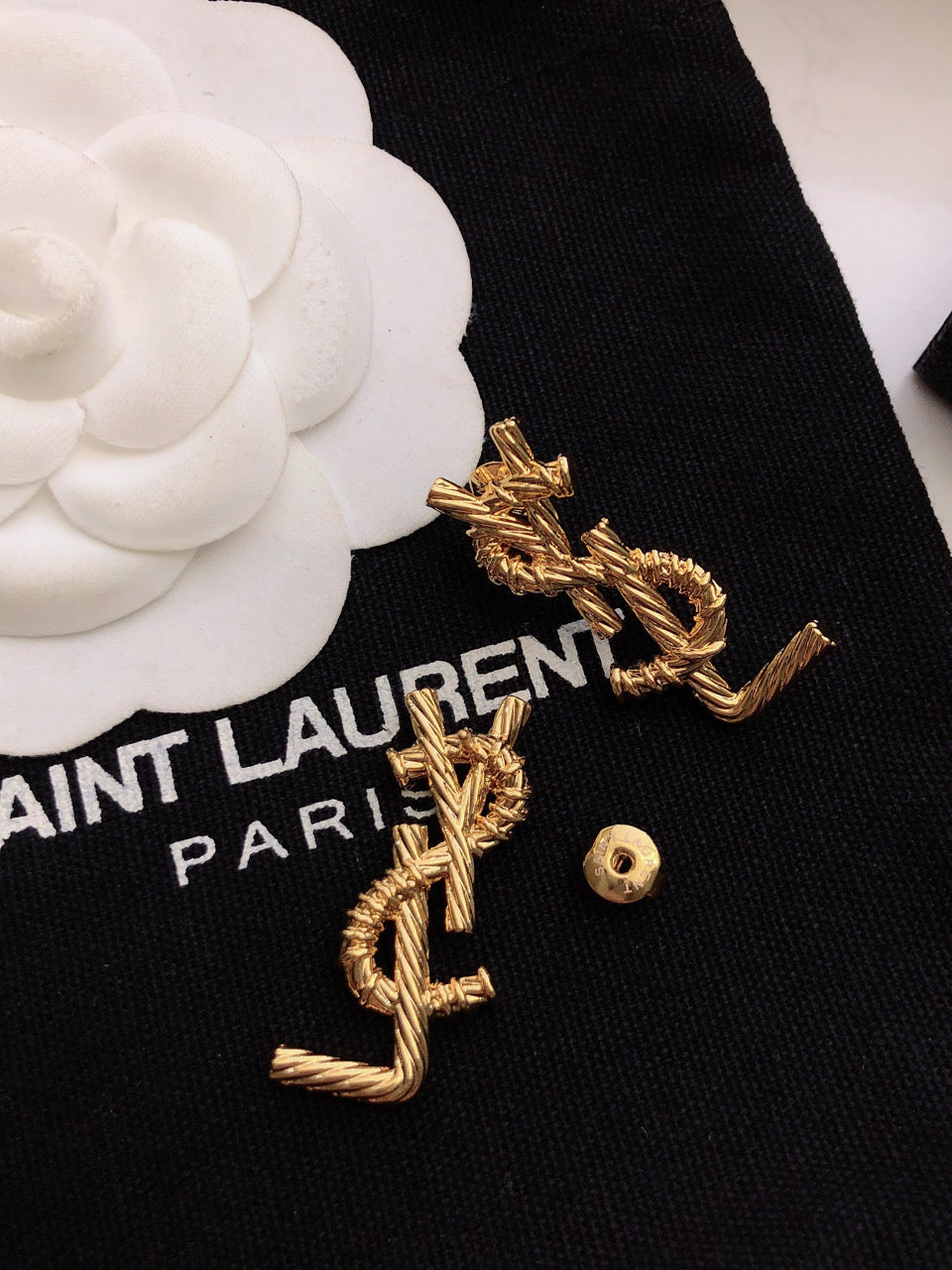 YSL 26S TWISTED ROPE LOGO STUD EARRINGS IN GOLD TONE METAL 629135