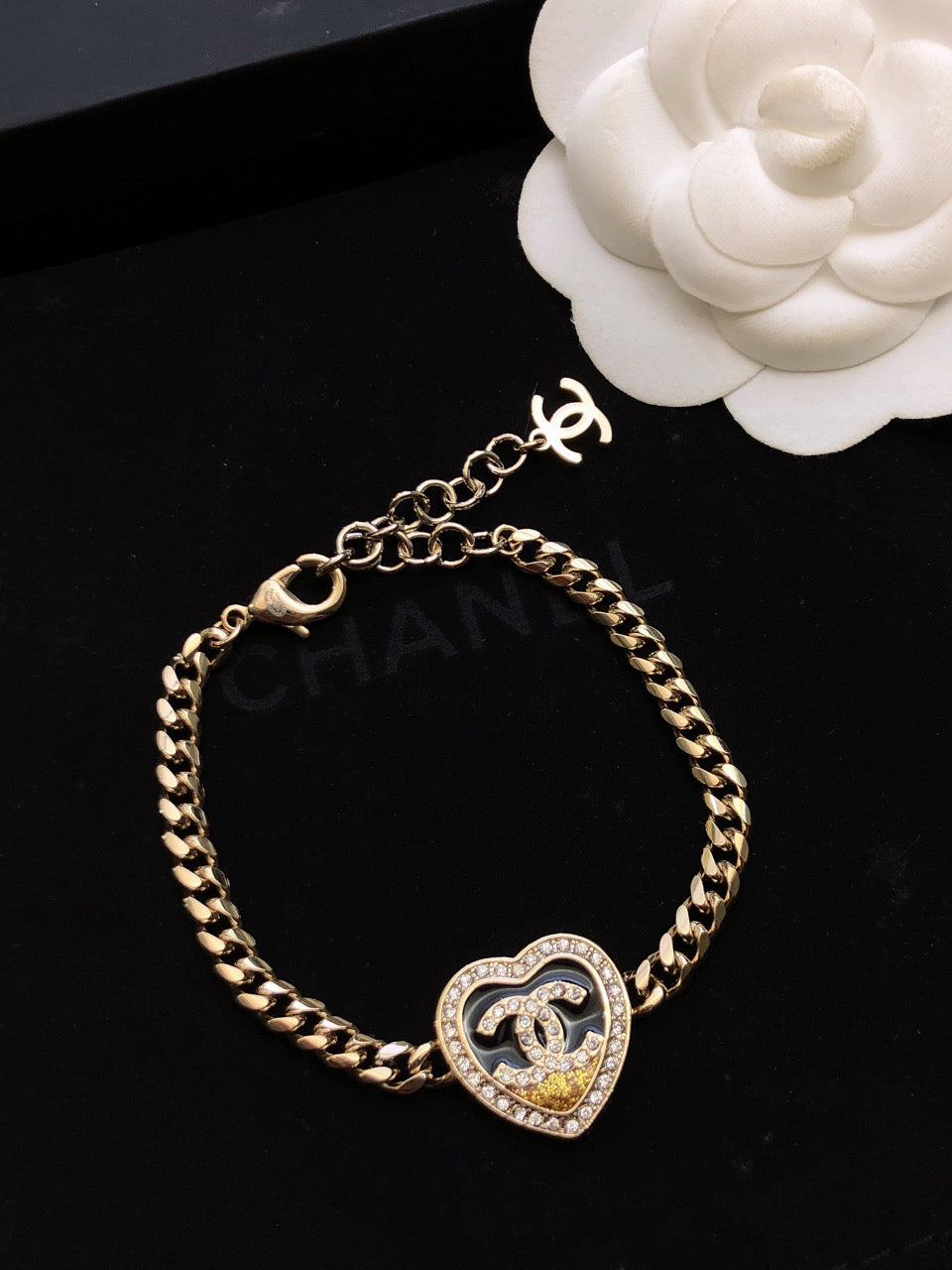 CHANEL 26S DOUBLE C LOGO PAVE CRYSTAL HEART CHAIN BRACELET IN GOLD METAL 633321