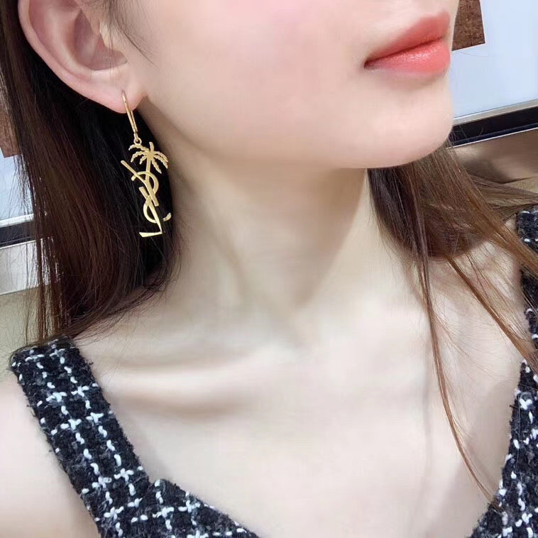 YSL 26S PALM TREE LOGO DROP EARRINGS IN GOLD TONE METAL 619168