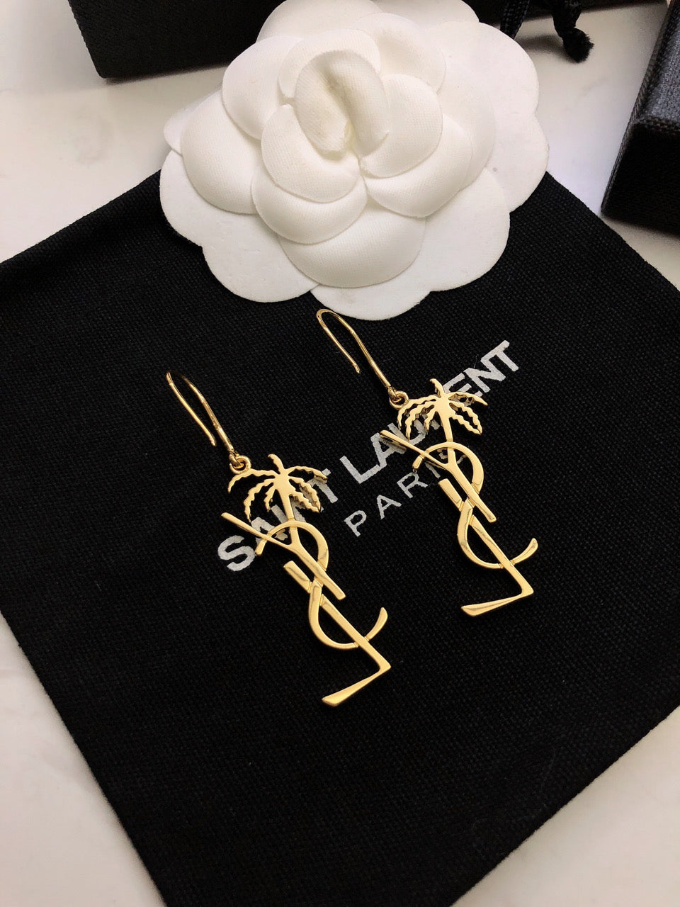 YSL 26S PALM TREE LOGO DROP EARRINGS IN GOLD TONE METAL 619168