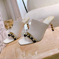 ROCKSTUD TOWER-HEEL MULES IN WHITE CALFSKIN 7 CM