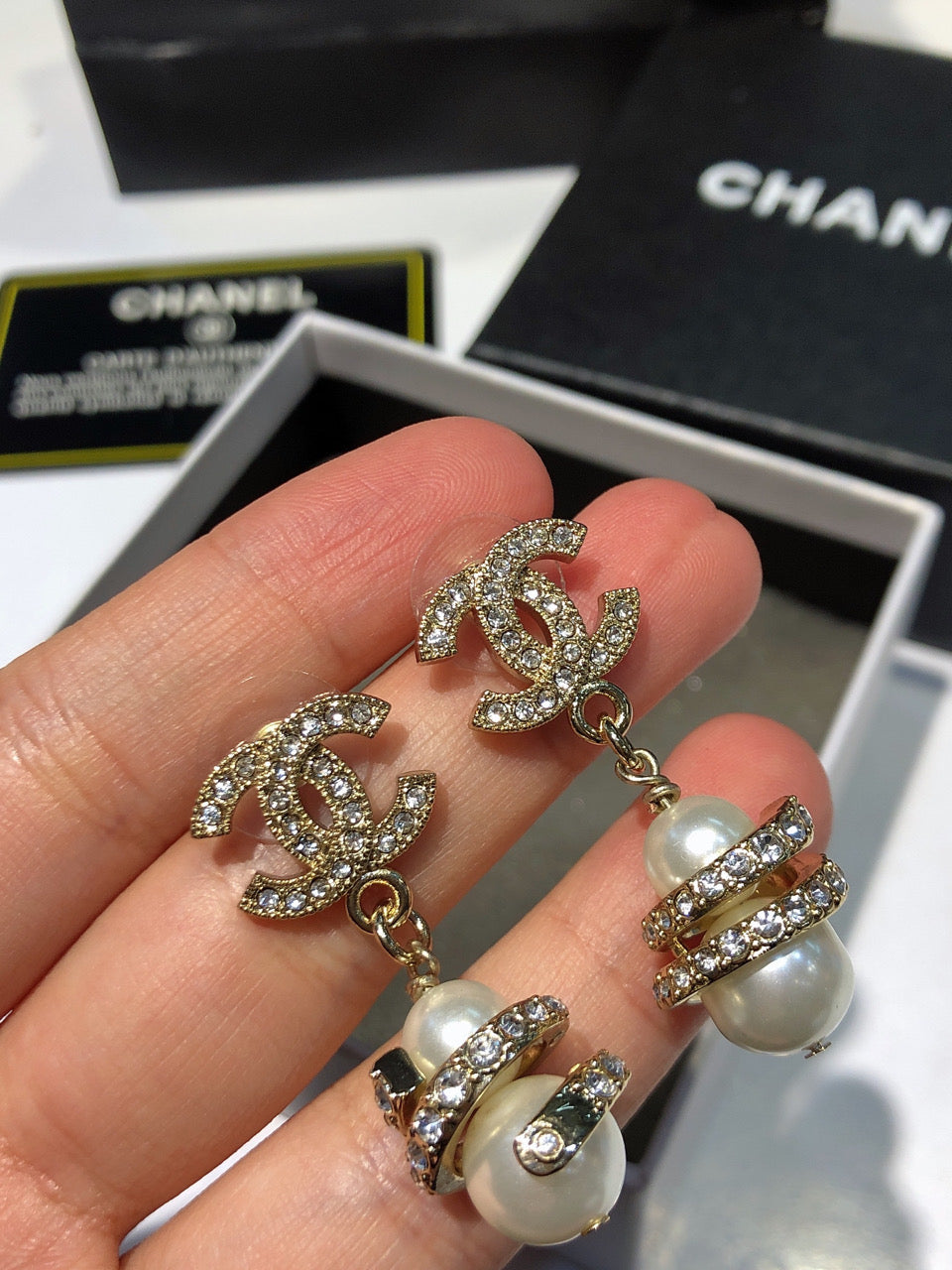 CHANEL 26S DOUBLE C LOGO PAVE CRYSTAL DROP EARRINGS WITH PEARL CHARM IN GOLD METAL 633339