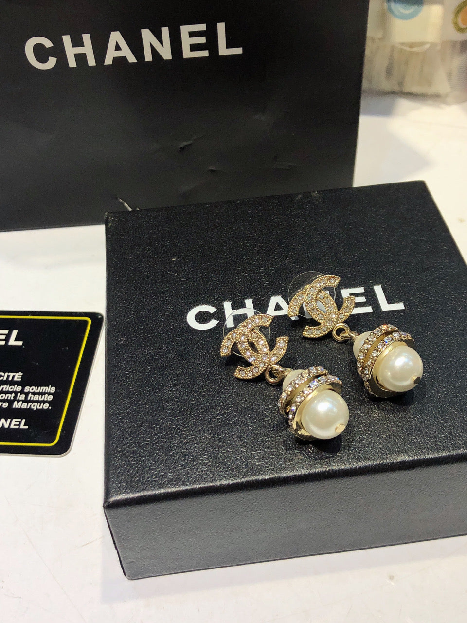 CHANEL 26S DOUBLE C LOGO PAVE CRYSTAL DROP EARRINGS WITH PEARL CHARM IN GOLD METAL 633339