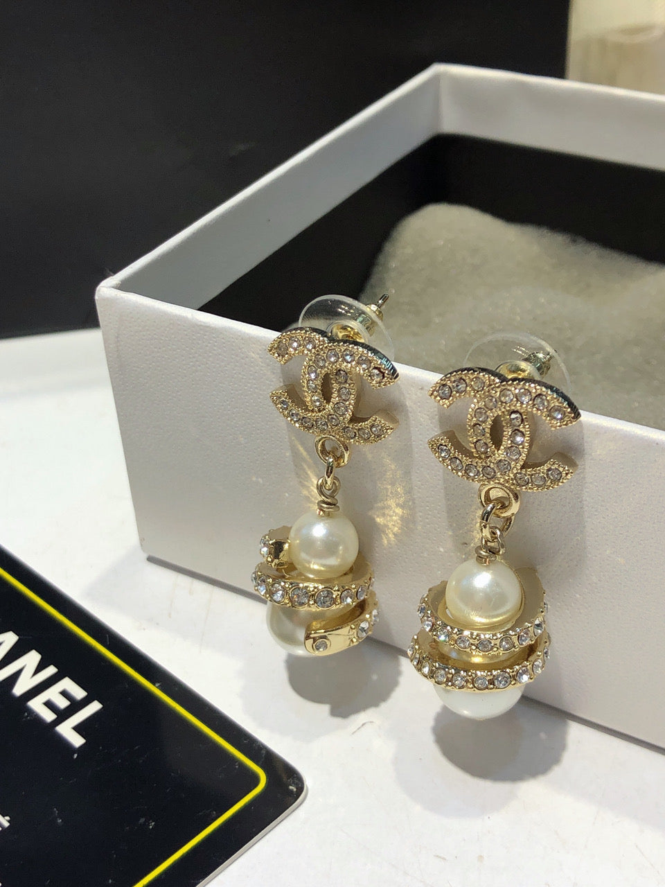 CHANEL 26S DOUBLE C LOGO PAVE CRYSTAL DROP EARRINGS WITH PEARL CHARM IN GOLD METAL 633339