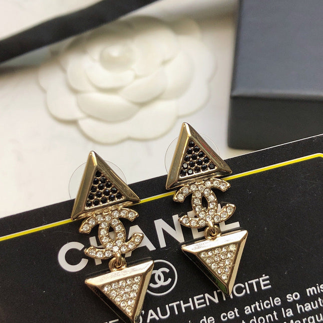 CHANEL 26S DOUBLE C LOGO TWO-TONE CRYSTAL TRIANGLE DROP EARRINGS IN GOLD METAL 631834