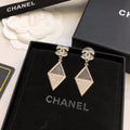 CHANEL 26S DOUBLE C LOGO TWO TONE PAVE CRYSTAL DIAMOND SHAPE DROP EARRINGS IN GOLD METAL 631833